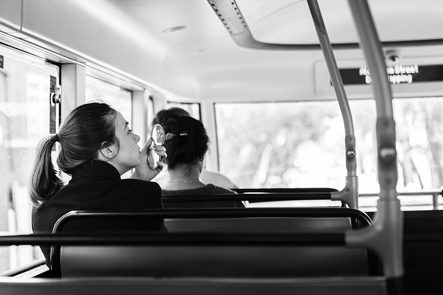girl riding a bus